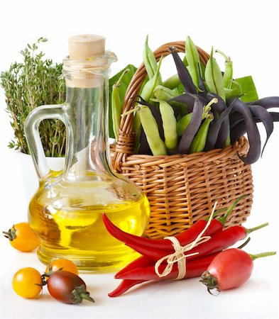 Fresh vegetables and jug of olive oil. Stock Photo - Budget Royalty-Free & Subscription, Code: 400-06393755
