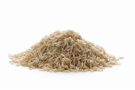 heap of wholegrain brown basmati rice on white isolated Stock Photo - Budget Royalty-Free & Subscription, Code: 400-06415291