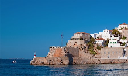 The historic entrance to the port of Hydra island, Greece Stock Photo - Budget Royalty-Free & Subscription, Code: 400-06415648