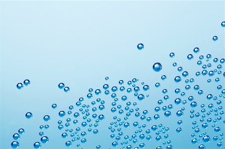 simsearch:400-06415772,k - Image abstraite d'un bleu bulles dans l'eau, tonte vers le haut. Photographie de stock - Aubaine LD & Abonnement, Code: 400-06415772