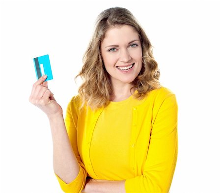 Beautiful american lady ready to shop. Holding credit card Stock Photo - Budget Royalty-Free & Subscription, Code: 400-06415809