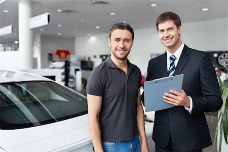 simsearch:400-06415950,k - The seller and the buyer in the auto show Stock Photo - Budget Royalty-Free & Subscription, Code: 400-06415908