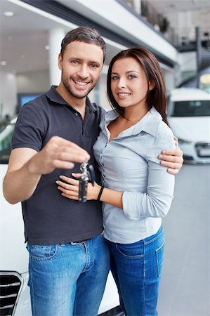 simsearch:400-08413489,k - Couple with the keys to car Stock Photo - Budget Royalty-Free & Subscription, Code: 400-06415924