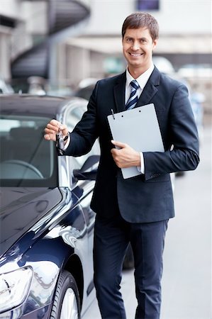 Sold with car keys in the showroom Stock Photo - Budget Royalty-Free & Subscription, Code: 400-06415931