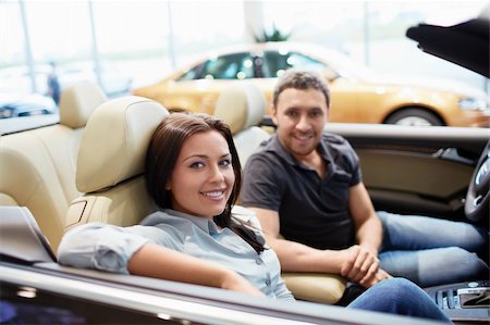 simsearch:400-08413489,k - Young couple in a cabriolet Stock Photo - Budget Royalty-Free & Subscription, Code: 400-06415942
