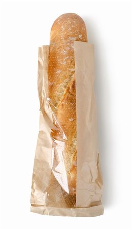 Baguette fraîche dans un sac en papier isolé sur fond blanc Photographie de stock - Aubaine LD & Abonnement, Code: 400-06416084