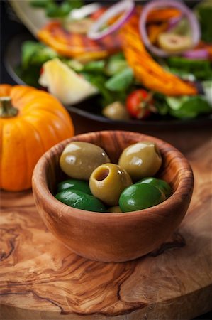 simsearch:400-07219392,k - Delicious green olives in the bowl with salad Stock Photo - Budget Royalty-Free & Subscription, Code: 400-06416360