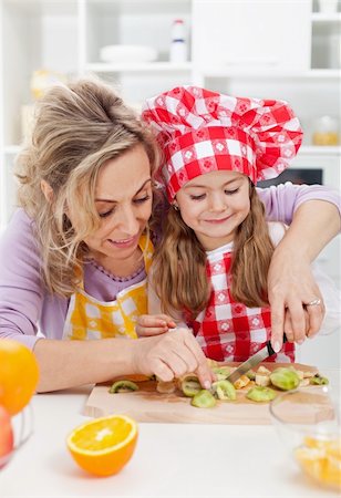 Woman and little girl making fresh fruits snack together - healthy eating concept Stock Photo - Budget Royalty-Free & Subscription, Code: 400-06416941