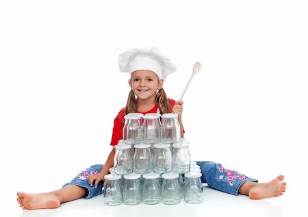 simsearch:649-06623037,k - Little happy chef girl ready for the autumn canning of goods - sitting with lots of jars Stock Photo - Budget Royalty-Free & Subscription, Code: 400-06416951