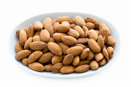 shelled whole almond nuts isolated on a white background Stock Photo - Budget Royalty-Free & Subscription, Code: 400-06417819