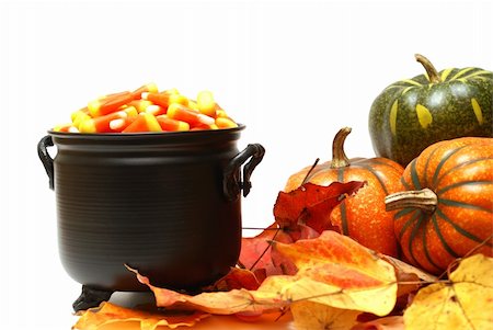 simsearch:400-06429990,k - A cauldron of candy corn next to pumkins and leaves. Stock Photo - Budget Royalty-Free & Subscription, Code: 400-06418178