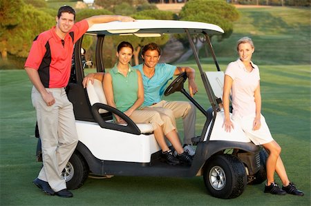 senior couple golf - Group Of Friends Riding In Golf Buggy On Golf Course Stock Photo - Budget Royalty-Free & Subscription, Code: 400-06419213