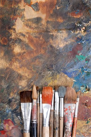 painter palette photography - Abstract background on paintera pallet with paint brushes Stock Photo - Budget Royalty-Free & Subscription, Code: 400-06419627