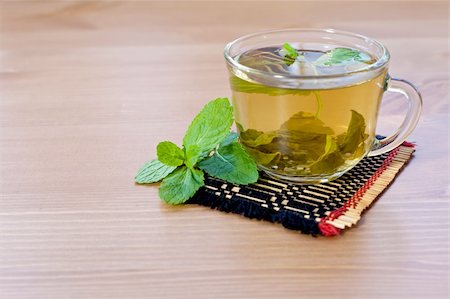 simsearch:400-06554630,k - green tea with mint on wooden table Stock Photo - Budget Royalty-Free & Subscription, Code: 400-06419668