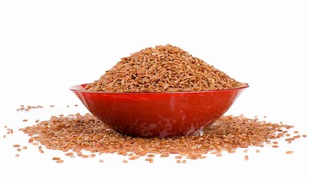 simsearch:400-07993665,k - red rice in a brown isolated on white Fotografie stock - Microstock e Abbonamento, Codice: 400-06424129