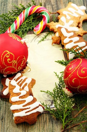Christmas balls, gingerbread and candy cane on a wooden table. Stock Photo - Budget Royalty-Free & Subscription, Code: 400-06424381