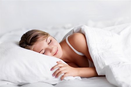 Young girl sleeping in bed Stock Photo - Budget Royalty-Free & Subscription, Code: 400-06424585