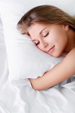 Young girl sleeping in bed Stock Photo - Budget Royalty-Free & Subscription, Code: 400-06424581
