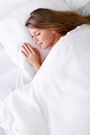 Young girl sleeping in bed Stock Photo - Budget Royalty-Free & Subscription, Code: 400-06424582