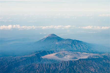 simsearch:400-04135827,k - Big volcano crater with other volcano top on background, bird's eye view. Java island, Indonesia Foto de stock - Royalty-Free Super Valor e Assinatura, Número: 400-06424894