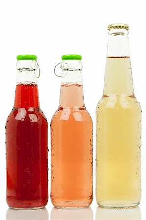 simsearch:400-05260769,k - Three bottles with different colored drinks Foto de stock - Royalty-Free Super Valor e Assinatura, Número: 400-06425190