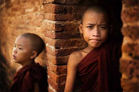Two young buddhist novice monk outside a temple background. Stock Photo - Budget Royalty-Free & Subscription, Code: 400-06425513