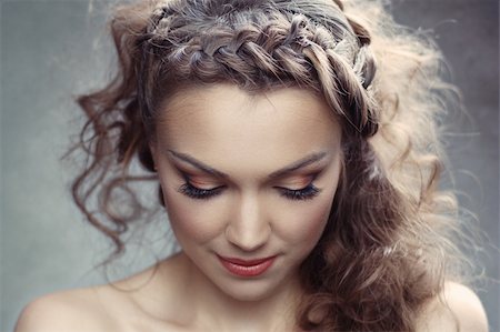 romantic hairstyle - A pretty woman with curly hair Stock Photo - Budget Royalty-Free & Subscription, Code: 400-06425935