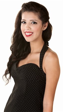 simsearch:400-05285711,k - Happy young Mexican teenager in polka dot dress over white Stock Photo - Budget Royalty-Free & Subscription, Code: 400-06426523
