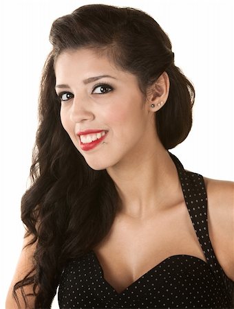 simsearch:400-06426526,k - Souriante jeune beauté hispanique avec robe à pois Photographie de stock - Aubaine LD & Abonnement, Code: 400-06426530