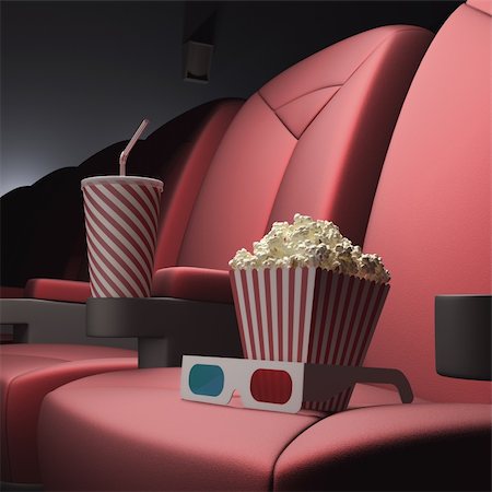 simsearch:400-09091954,k - Popcorn, soda and 3D glasses on the seat, ready for the film. Stock Photo - Budget Royalty-Free & Subscription, Code: 400-06428363