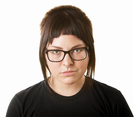 Sneering female adult with nose ring and eyeglasses Stock Photo - Budget Royalty-Free & Subscription, Code: 400-06429239