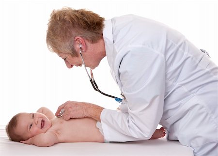 simsearch:400-08935984,k - female doctor checking a baby on white isolated background Stock Photo - Budget Royalty-Free & Subscription, Code: 400-06420089
