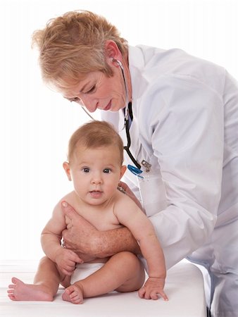 simsearch:400-04114664,k - female doctor checking a baby on white isolated background Foto de stock - Royalty-Free Super Valor e Assinatura, Número: 400-06420091
