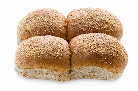 wholewheat bread rolls isolated on a white background Fotografie stock - Microstock e Abbonamento, Codice: 400-06420176