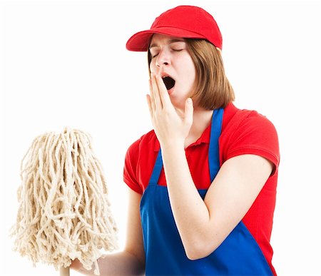 simsearch:400-06685903,k - Tired teenage girl in her work uniform, holding a mop and yawning.  Isolated on white. Fotografie stock - Microstock e Abbonamento, Codice: 400-06420493