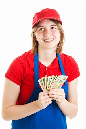 simsearch:400-06333295,k - Jeune adolescente dans son uniforme de travail, tenant une poignée d'argent. Isolé sur fond blanc. Photographie de stock - Aubaine LD & Abonnement, Code: 400-06420509