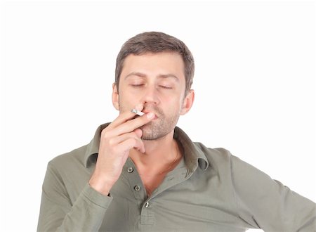 puff - Satisfied man smoking with a blissful expression on his face and his eyes closed as he puffs away on a cigarette isolated on white Stock Photo - Budget Royalty-Free & Subscription, Code: 400-06421188