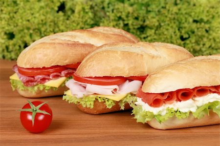 simsearch:400-06421213,k - Sandwiches with ham, salami and smoked salmon Foto de stock - Super Valor sin royalties y Suscripción, Código: 400-06421213