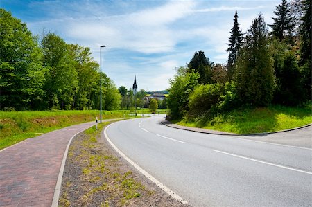 dangerous curve - Asphalt  Road to the German City in Bavaria Stock Photo - Budget Royalty-Free & Subscription, Code: 400-06422206