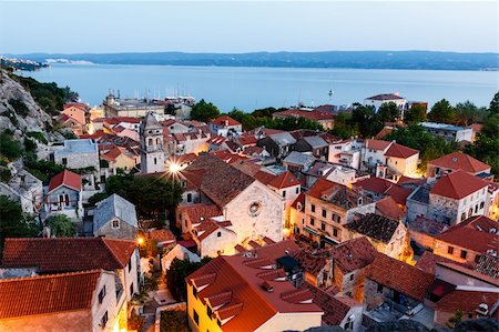 Aerial View on Illuminated Town of Omis in the Evening, Croatia Stock Photo - Budget Royalty-Free & Subscription, Code: 400-06422237