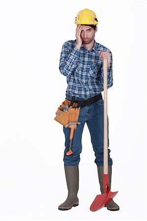 shovel in dirt - Tired man with spade Stock Photo - Budget Royalty-Free & Subscription, Code: 400-06422246