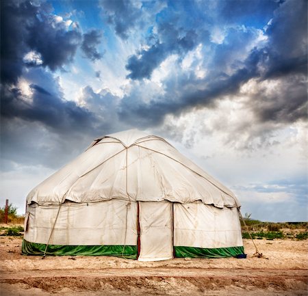 Yurt traditional nomadic house in central Asia at dramatic sky background Stock Photo - Budget Royalty-Free & Subscription, Code: 400-06422568
