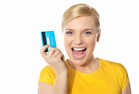 Blond sales girl posing with credit card and smiling at camera Stock Photo - Budget Royalty-Free & Subscription, Code: 400-06422761