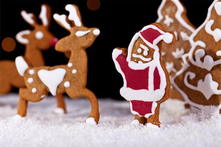 simsearch:400-06430094,k - Christmas food setting - gingerbread santa with deers, closeup Stock Photo - Budget Royalty-Free & Subscription, Code: 400-06430102
