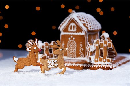 snowy night at home - Christmas gingerbread cookie house and deers - holidays food setting Stock Photo - Budget Royalty-Free & Subscription, Code: 400-06430118