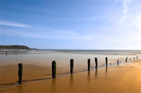 sunshine over the beach breakers in Youghal county Cork Ireland on a summers day Foto de stock - Royalty-Free Super Valor e Assinatura, Número: 400-06430123