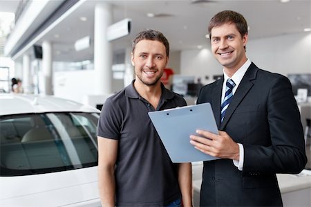 Buyer and seller about cars Stock Photo - Budget Royalty-Free & Subscription, Code: 400-06456388