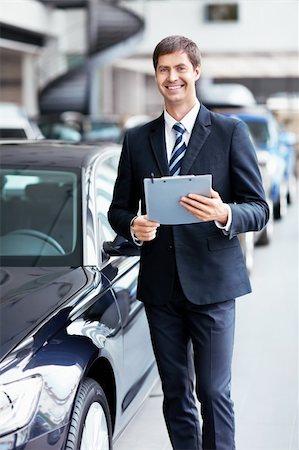 simsearch:400-06415929,k - Man in suit at the car Stockbilder - Microstock & Abonnement, Bildnummer: 400-06456404