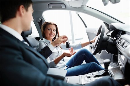 simsearch:400-06415929,k - Seller and buyer at the wheel Stockbilder - Microstock & Abonnement, Bildnummer: 400-06456400