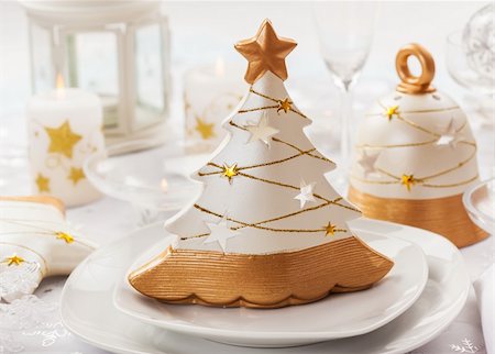 Festive table for Christmas with small tree in white and golden tones Stock Photo - Budget Royalty-Free & Subscription, Code: 400-06457284